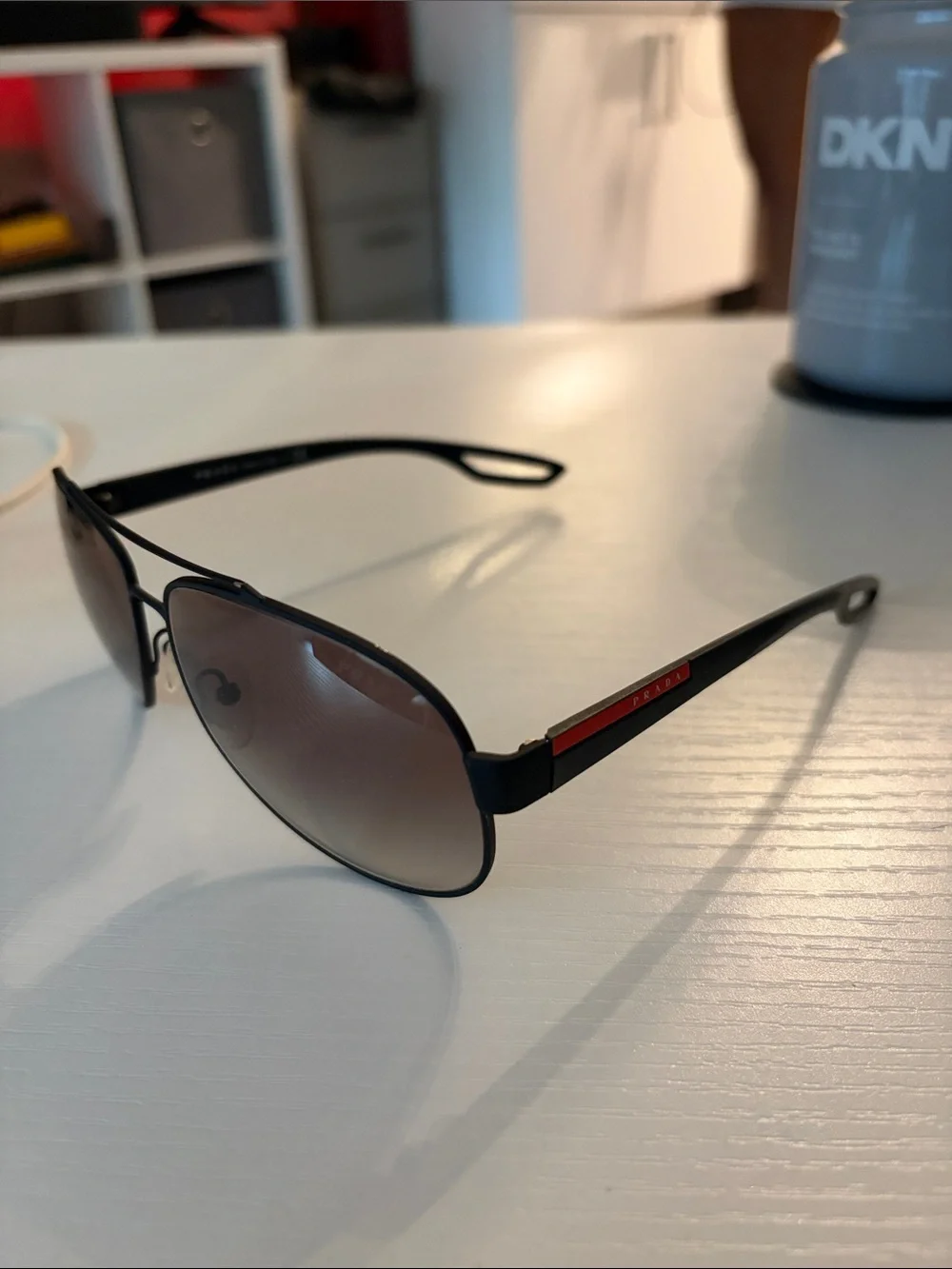 Prada Men's Black Sunglasses with Red Accent